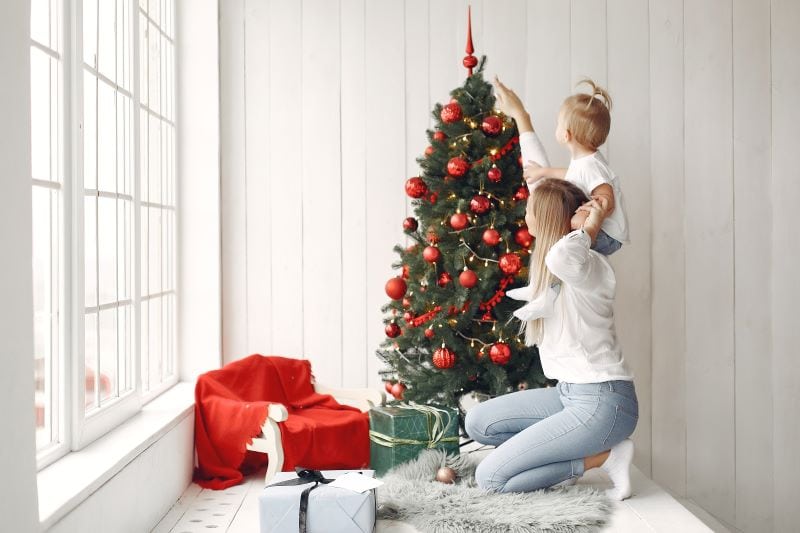 28. Make Your Home Sparkle this Christmas with Delightful Artificial Flocked Trees and Ornaments
